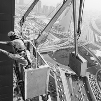 Difficult job of towers' façade-glass cleaners