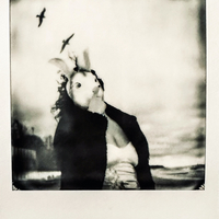 Self-portrait by the sea